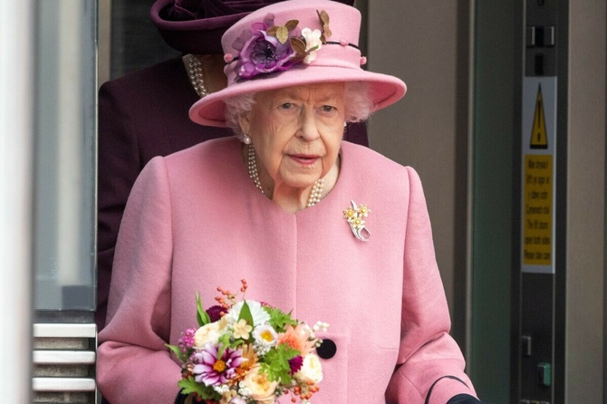 The Queen wipes a tear as Prince Charles and Princess Beatrice cry